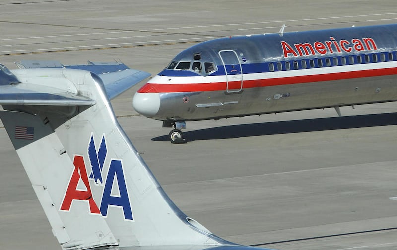 An American Airlines jet taxis at Dallas Fort Worth Airport.