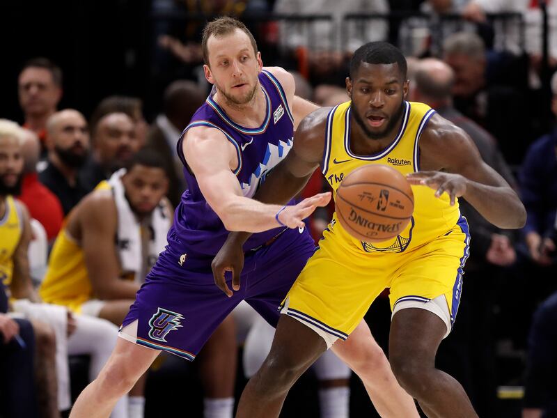 Utah Jazz forward Joe Ingles guards Golden State Warriors Eric Paschall at Vivint Arena in Salt Lake City on Friday, Nov. 22, 2019.