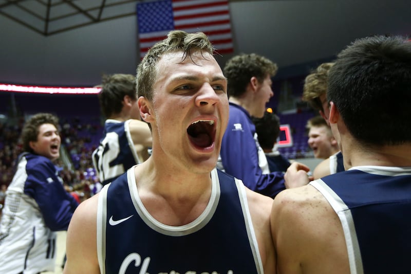Corner Canyon Chargers' Gabe Toombs (32) celebrates beating the Jordan Beetdiggers to win the 5A Championship game at the Dee Events Center in Ogden on Saturday, March 2, 2019.
