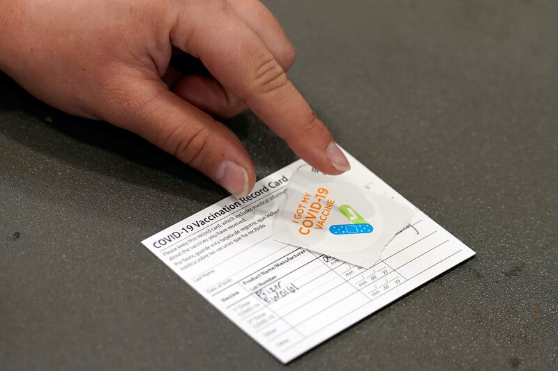 A COVID-19 vaccination card in Wilmington, California.