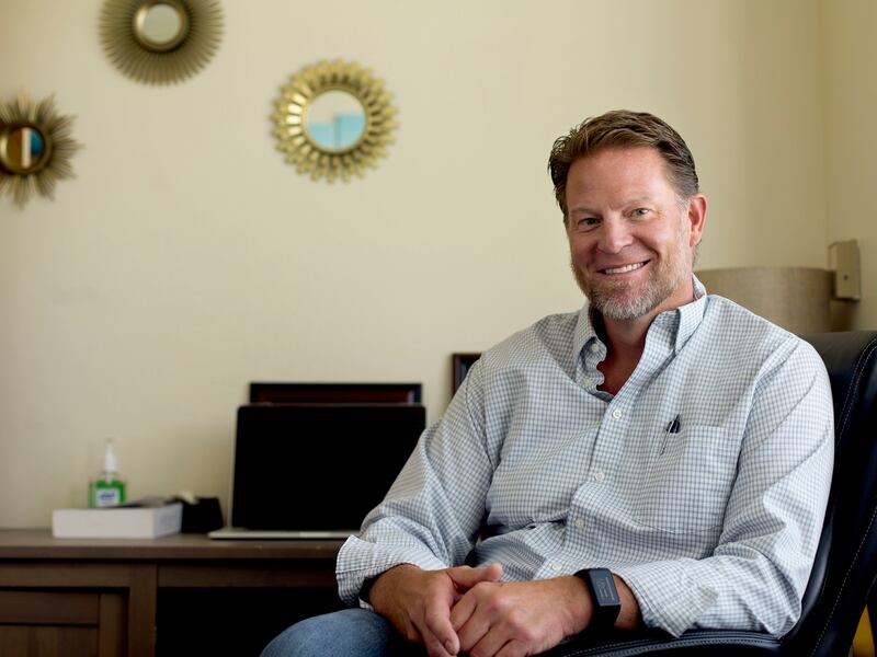 Dr. Rob Butters, Ph.D, LCSW, sits in his office in West Valley City on Wednesday, July 18, 2018.