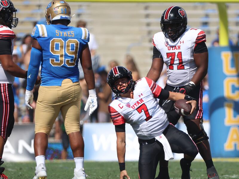 Utah Utes quarterback Cameron Rising (7) gets up after getting sacked in the game against UCLA at the Rose Bowl in Pasadena, Calif., on Saturday, Oct. 8, 2022.