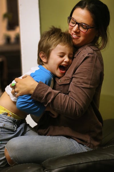 Aliska Julian tickles son Morrissey at their home in Salt Lake City on Tuesday, Oct. 10, 2017. Aliska and her husband, Nate, a have decided to not have more than two children.