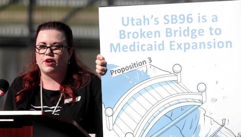Stacy Stanford, of the Utah Health Policy Project, speaks during a press conference at Liberty Park in Salt Lake City on Monday, April 1, 2019. During the press conference, health care advocates highlighted areas where Utahns will be left behind through t