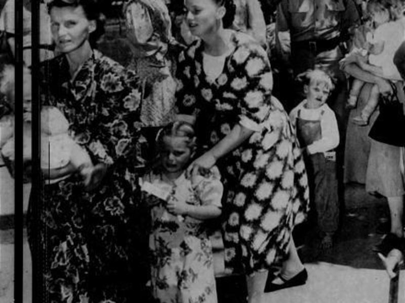 Women and children are rounded up during the 1953 raid in Short Creek, Ariz. The raid became a rallying point for the FLDS.