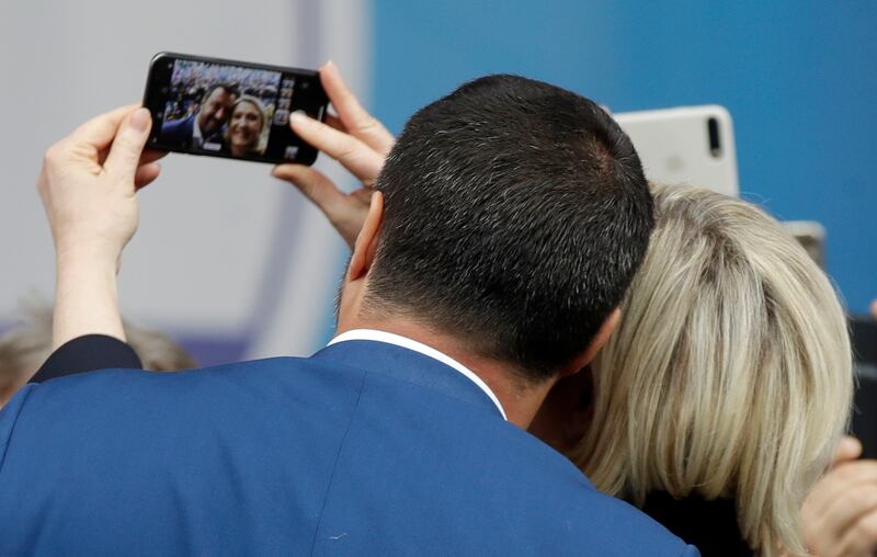 Matteo Salvini and Marine Le Pen, leader of the French National Front, take a selfie.
