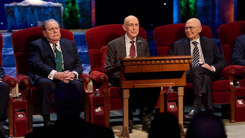 President Henry B. Eyring speaks during the First Presidency's Christmas Devotional broadcast on Sunday, Dec. 7, 2025. President Dallin H. Oaks and President Jeffrey R. Holland are seated on either side of him.