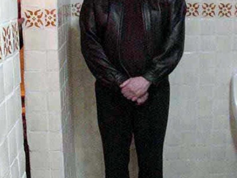FILE - In this March 9, 2002 file photo released by Mexico's Attorney General's Office, Benjamin Arellano Felix stands in his home the day of his arrest in Puebla, Mexico. Arellano Felix will plead guilty to unspecified charges, the U.S. attorney's offi