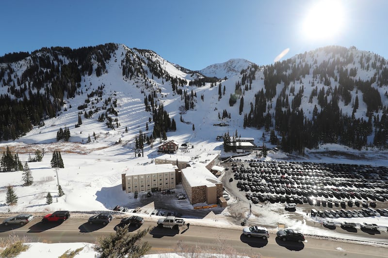 Cars are parked on Little Cottonwood Canyon Road in Alta on Saturday, Dec. 15, 2018.