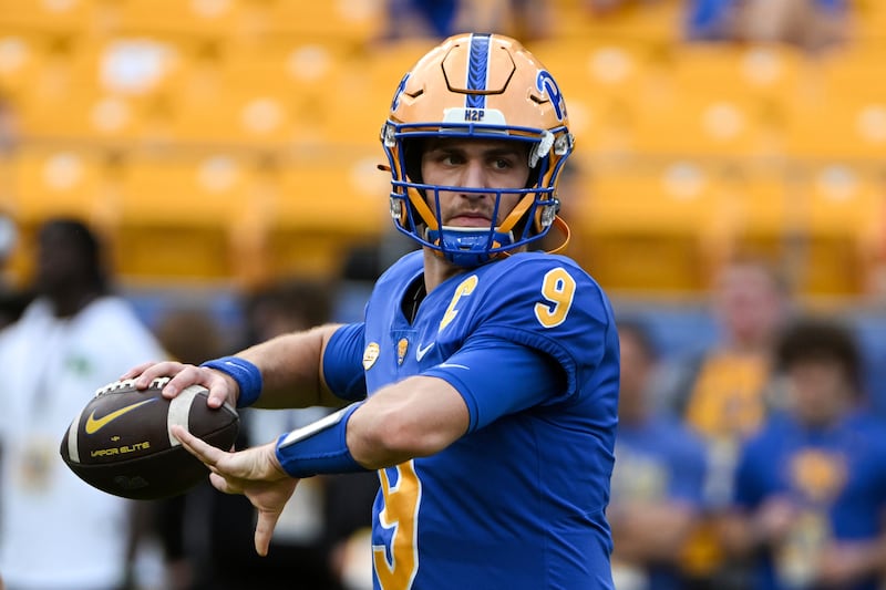 Pittsburgh quarterback Kedon Slovis warms up against Syracuse during game, Saturday, Nov. 5, 2022, in Pittsburgh, Pa.