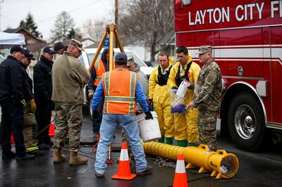 Members of the Utah National Guard's 85th Civil Support Team assist in ferreting out the source of fumes that mad residents sick and displaced at least two families in Layton on Wednesday, Feb. 27, 2019.