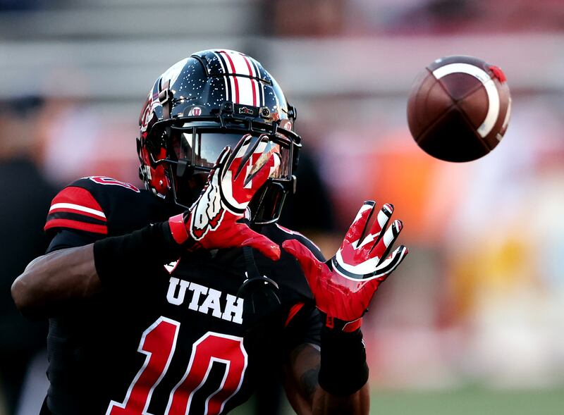 Utah Utes wide receiver Money Parks makes a catch during warmups prior to Utah-USC game in Salt Lake City, Oct. 15, 2022.