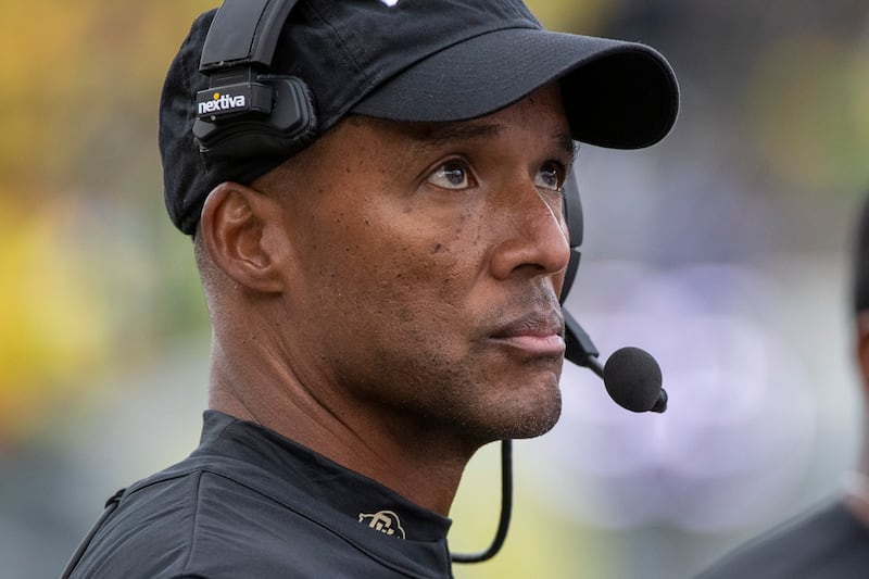 Colorado coach Karl Dorrell looks at the scoreboard during game against Oregon Saturday, Oct. 30, 2021, in Eugene, Ore.