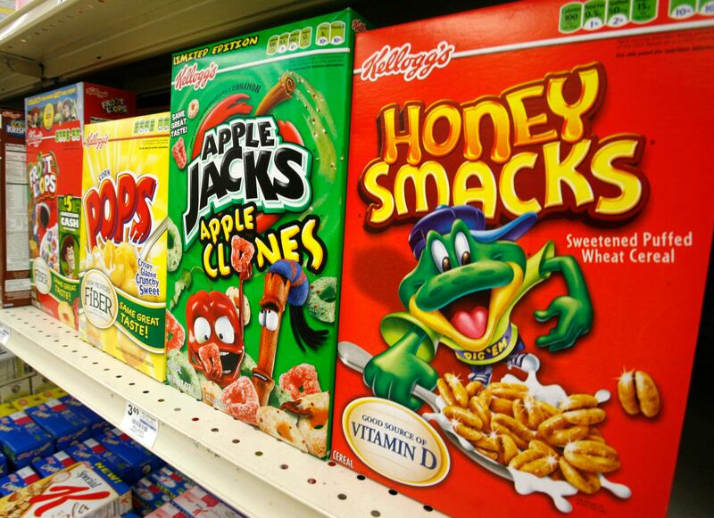 Hold for Business Photo: Boxes of Kellogg's Froot Loops, Corn Pops, Apple Jacks, and Honey Smacks sit on the shelf of a Mt. Lebanon, Pa., grocery store Friday, June 25, 2010. (AP Photo/Gene J. Puskar)