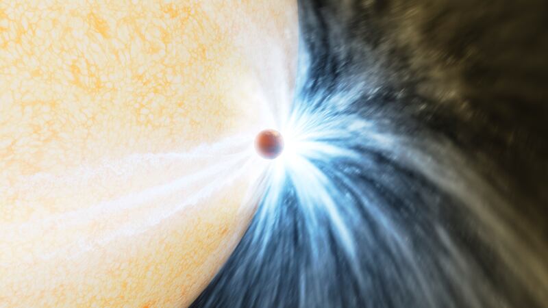 This illustration provided Caltech/IPAC by depicts a planet skimming the surface of its star. Astronomers reported their observations Wednesday, May 3, 2023, of what appears to be a gas giant at least the size of Jupiter being eaten by its star. The sun-like star had been puffing up with old age for eons and finally got so big that it engulfed the close-orbiting planet.