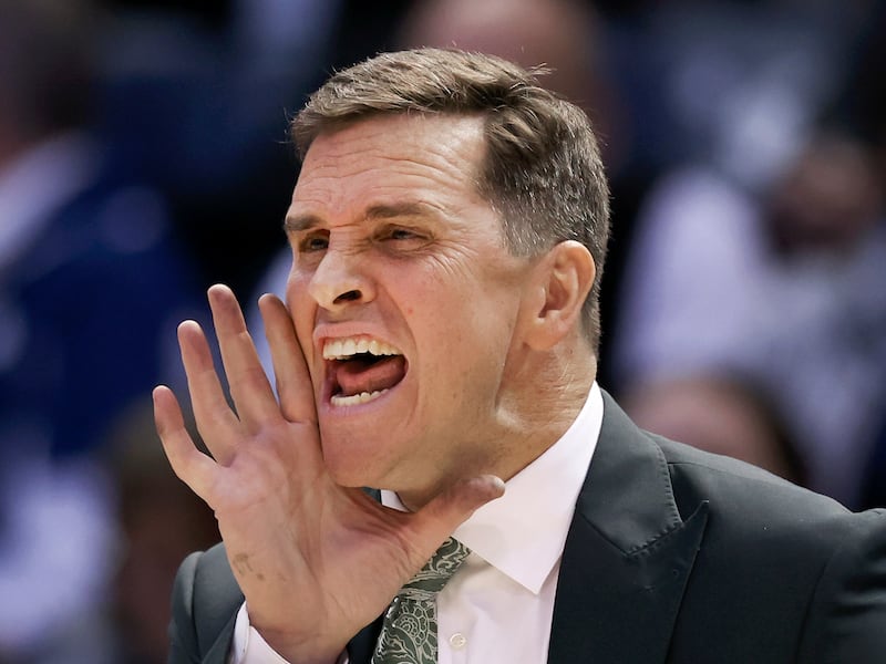 UVU Basketball Coach Mark Madsen yells