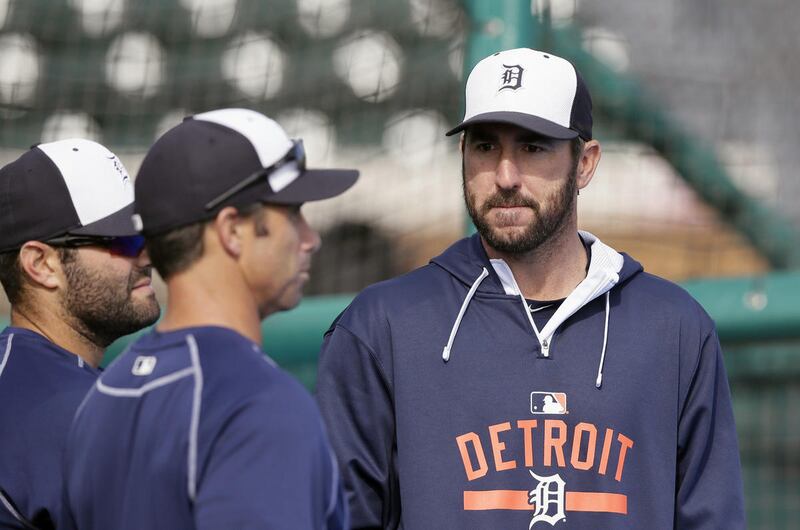 FILE - In this March 28, 2015, file photo, Detroit Tigers starting pitcher Justin Verlander, right, is seen with catcher Alex Avila, left, and manager Brad Ausmus before a spring training exhibition baseball game against the St. Louis Cardinals in Lakelan