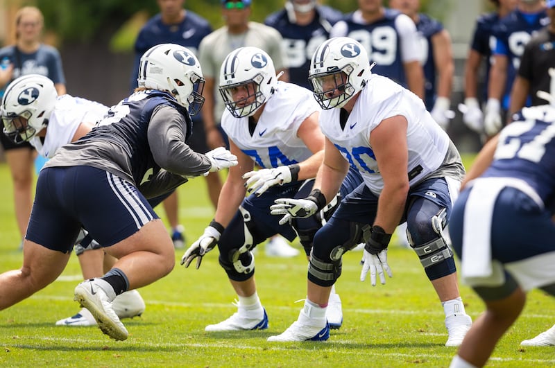 Clark Barrington and Connor Pay during a BYU Cougars football practice in Provo, Utah, on August 4, 2022.