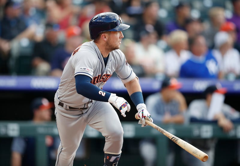 FILE - Houston Astros' Alex Bregman watches his solo home run off Colorado Rockies starting pitcher Peter Lambert during the first inning of a baseball game Wednesday, July 3, 2019, in Denver.