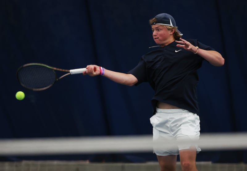 Brighton’s Ford Owen swings at the ball