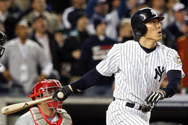 The Yankees' Hideki Matsui hits a 2-run double in the fifth against the Phillies in Game 6 of the 2009 MLB World Series.