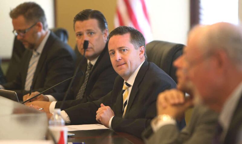 Rep. Derek Brown, R-Cottonwood Heights, seen here speaking at a public meeting at the Utah State Capitol in Salt Lake City, Wednesday, July 3, 2013, is resigning his seat in the Utah Legislature to serve as Sen. Mike Lee's deputy chief of staff and state