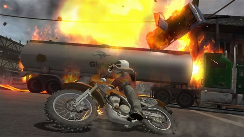 A Hollywood stuntman slides under a flaming tanker truck in "Stuntman: Ignition."