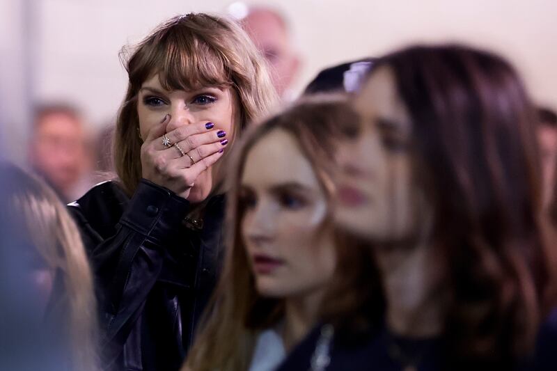 Taylor Swift reacts as she leaves Met Life Stadium after watching a game between the New York Jets and the Kansas City Chiefs, Monday, Oct. 2, 2023.