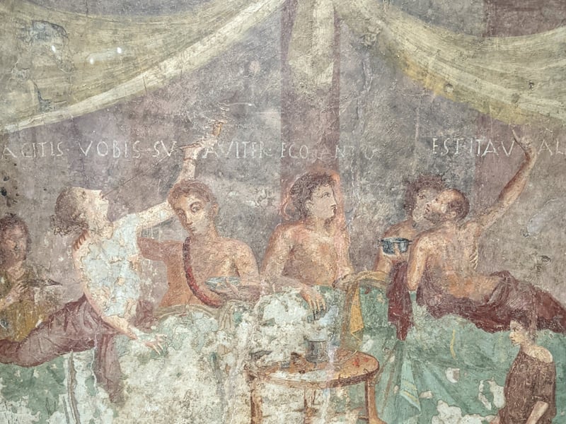 Roman fresco depicting a dinner party.