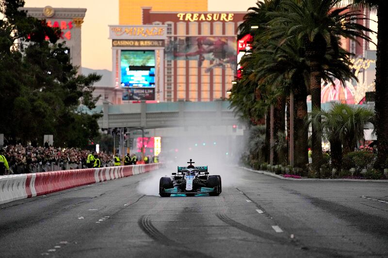 Mercedes’ George Russell drives during a demonstration along the Las Vegas Strip at a launch party for the Formula One Las Vegas Grand Prixon Nov. 5, 2022, in Las Vegas.