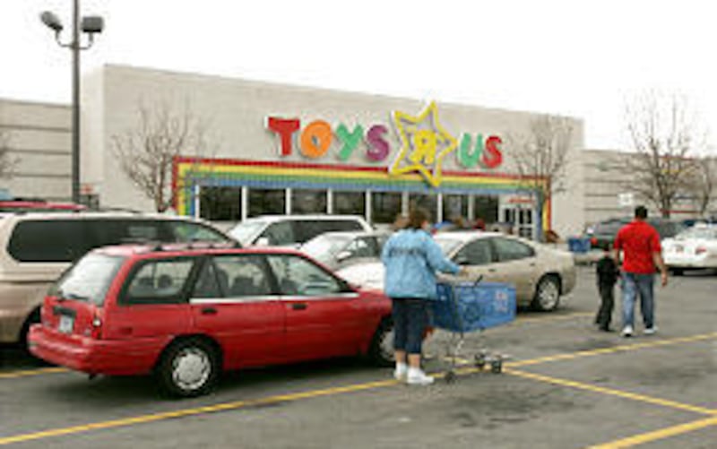 Customers shop at the Toys R Us store in Orem. The chain's new owners will decide what stores, if any, will be closed.
