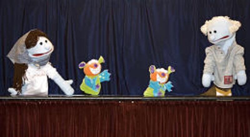 Puppets perform at Salt Lake City Main Library's puppetry festival. Hundreds of kids and their families attended the event.