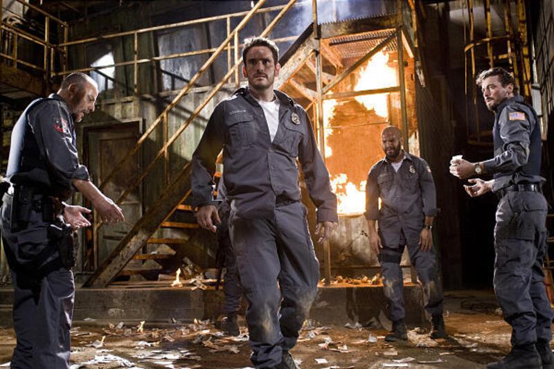 Jean Reno, left, Matt Dillon, Amaury Nolasco and Skeet Ulrich star in the action thriller flick "Armored."