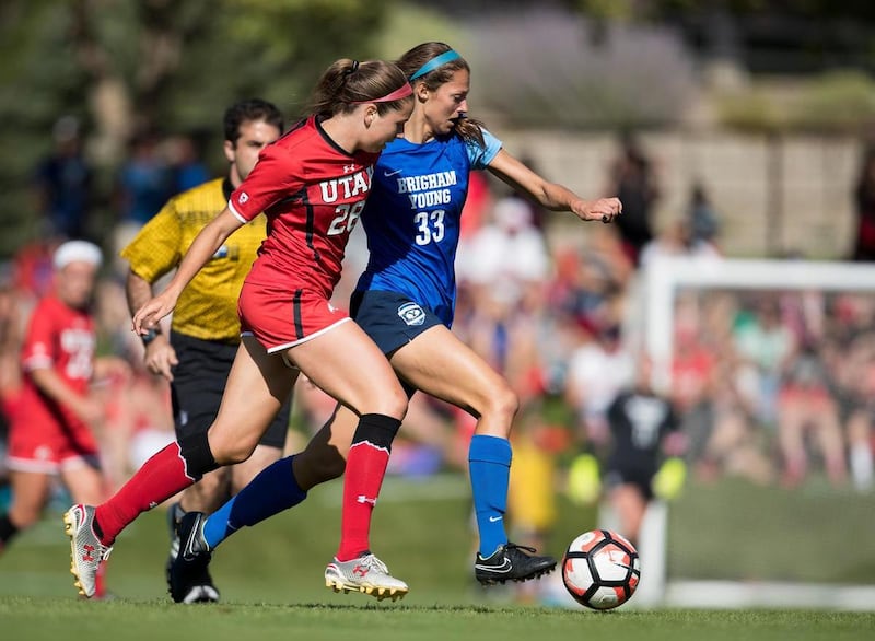 BYU’s Ashley Hatch advances the ball during a game against the University of Utah.