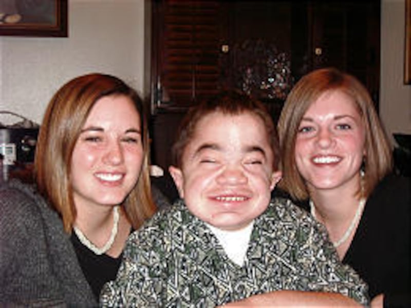 Matt Kristensen with sisters Cari and Cassy shortly before he died of a rare enzyme deficiency in 2002.