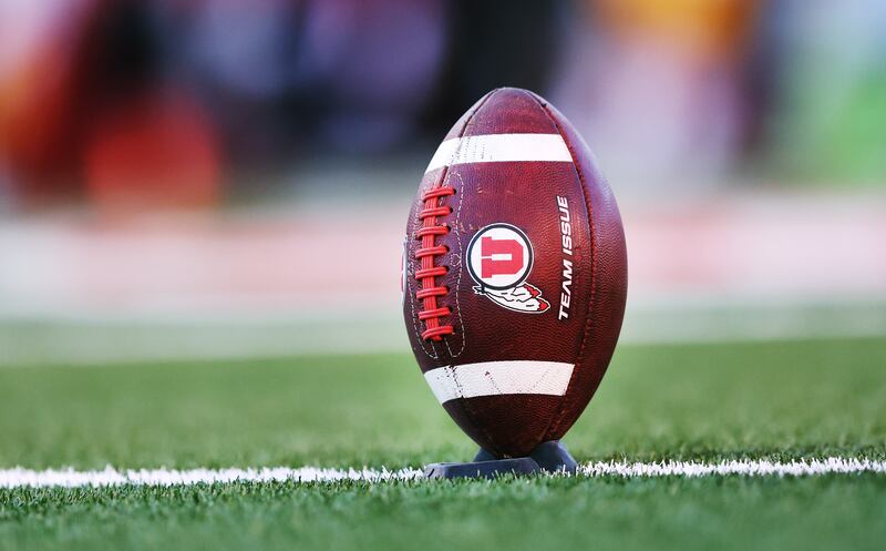A football sits on the tee. Utah plays at USC on Saturday.