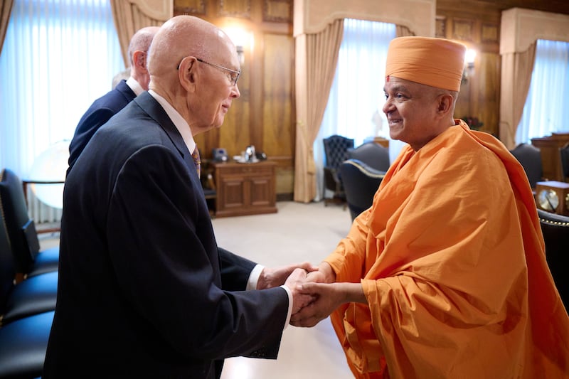 President Dallin H. Oaks and President Henry B. Eyring of the church's First Presidency meet His Holiness Brahmavihari Swamiji, head of BAPS Hindu Mandir Abu Dhabi, in Salt Lake City, Utah, on Wednesday, June 18, 2025.