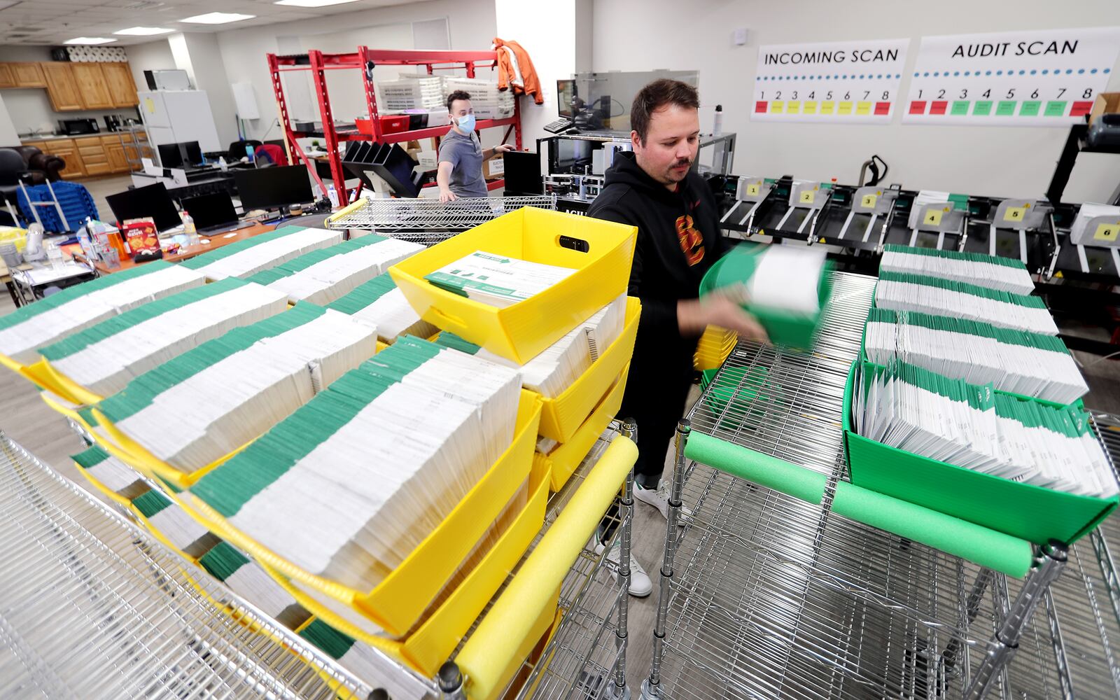 Election ballots are processed by workers at the Utah County Clerk/Auditor’s Office in Provo on Tuesday, Oct. 27, 2020.
