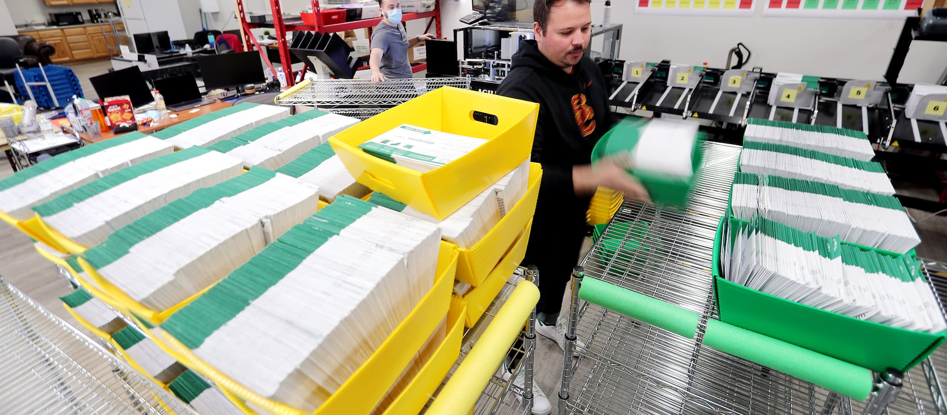 Election ballots are processed by workers at the Utah County Clerk/Auditor’s Office in Provo on Tuesday, Oct. 27, 2020.