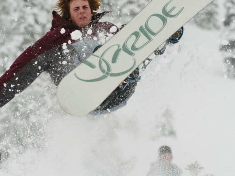 FILE — Dana Mansfield snowboards with friends at Alta Ski Resort Oct 24th, 2004. As Utah resorts gear up for the winter season, a federal appeals court will hear arguments from a group of snowboarders who want to ride at skiers-only Alta.