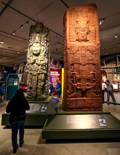 Fifth and sixth graders from Emerson Elementary School enjoy the Natural History Museum's new show, "Maya: Hidden Worlds Revealed," in Salt Lake City on Thursday, Nov. 8, 2018.