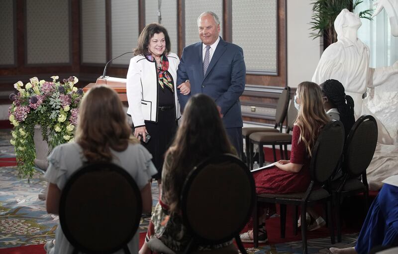 Elder Ronald A. Rasband, of Quorum of the Twelve Apostles, and his wife, Sister Melanie Rasband, speak to missionaries.