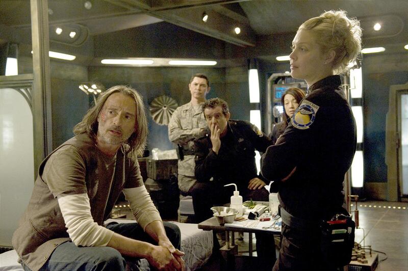 Dr. Nicholas Rush (Robert Carlyle, left), Col. Telford (Lou Diamond Phillips), Col. Everett Young (Louis Ferrerira), Camile Wray (Ming-Na) and 1st Lt. Tamara Johansen (Alaina Huffman) in "Stargate Universe."