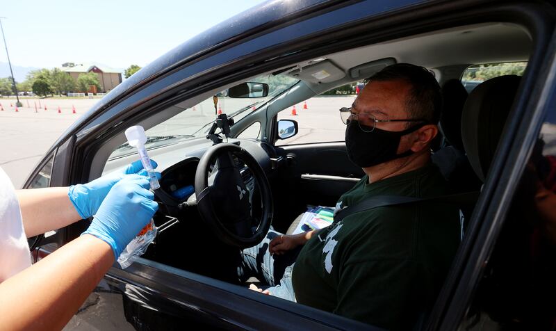 Kait Sorensen gives directions on how to do a saliva COVID-19 test.