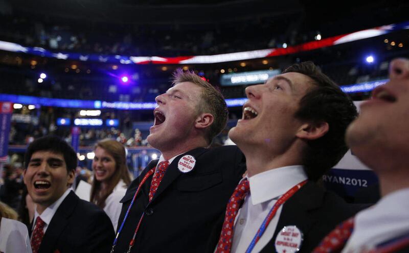 Pages react as Mitt Romney is nominated for the Office of the President of the United States at the Republican National Convention in Tampa, Fla., on Tuesday, Aug. 28, 2012.