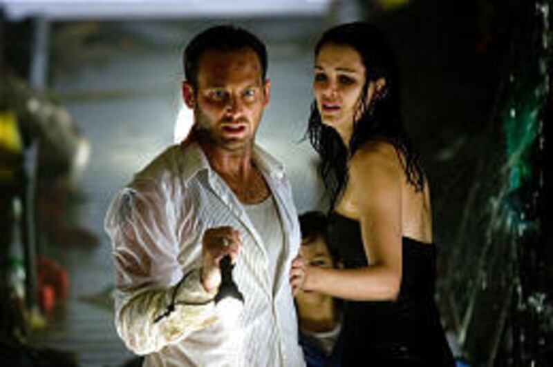Josh Lucas plays Dylan Johns and Jacinda Barrett is Maggie James in "Poseidon," a disastrous remake of "The Poseidon Adventure."