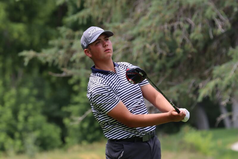 David Liechty watches his shot