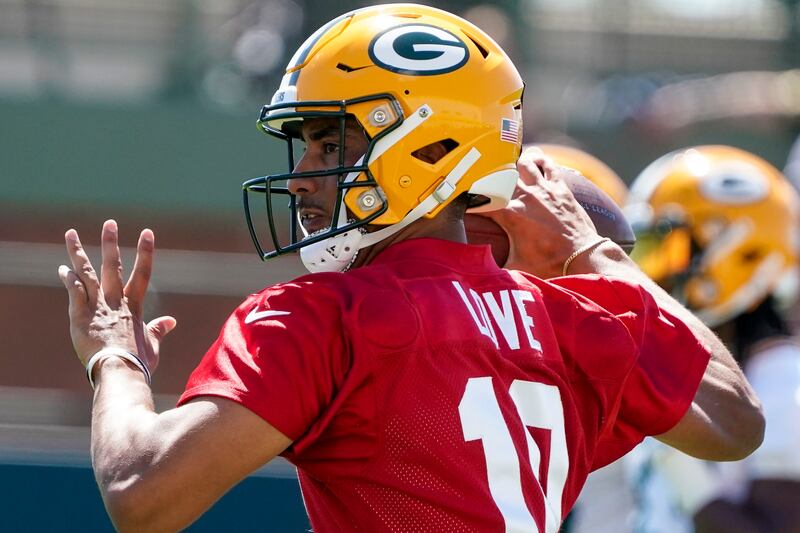 Green Bay Packers’ Jordan Love runs a drill at the NFL football team’s practice field.