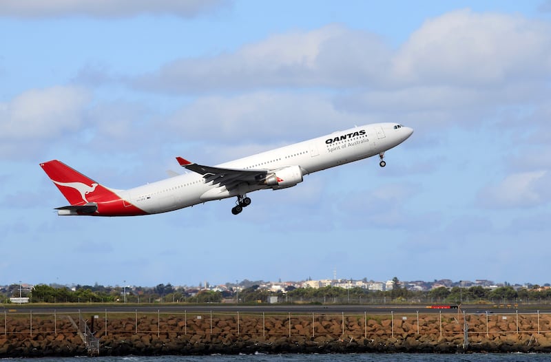 An airplane takes flight from Australia with the Qantas logo and name on it. The TSA list of prohibited and allowed items has a few strange entries.