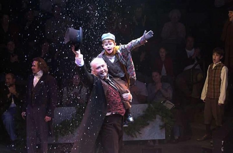 Richard Wilkins as Scrooge and Scott Fidel as Tiny Tim in Hale Centre Theatre’s 2002 production of “A Christmas Carol.”